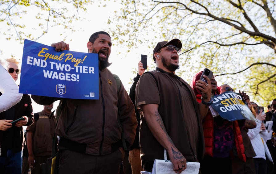 UPS workers and Teamsters members during a rally outside a UPS hub in the Brooklyn borough of New York on Friday, April 21, 2023.