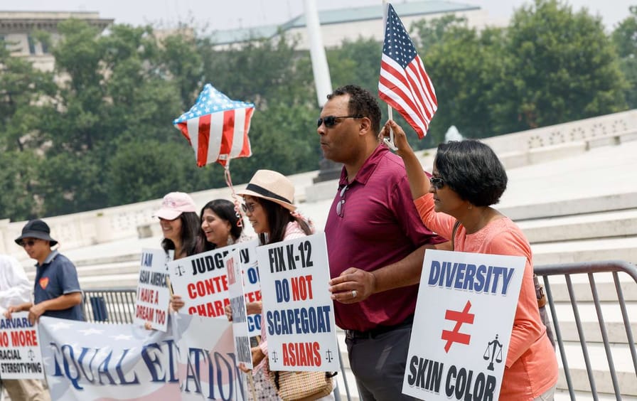 Anti–affirmative action activists with the Asian American Coalition for Education protest outside the US Supreme Court Building on June 29, 2023.