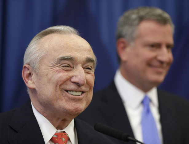 William-Bratton-left-smiles-while-New-York-mayor-elect-Bill-de-Blasio-looks-on-during-a-news-conference-in-New-York-Thursday-Dec.-5-2013.-AP-Photo