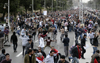 Street Fights Rock Cairo as Supporters and Foes of Morsi Clash over Constitution