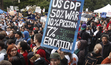 California Teachers Protest Cuts, Gov. Snyder Heckled at Parade