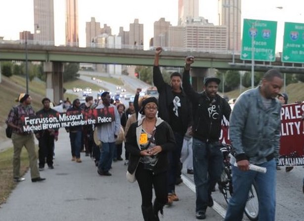 Students Blockade I-75, Stage a ‘Shit-In’ for Trans Justice and Get ‘Real’ With George Will