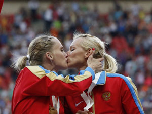 Was a Kiss Just a Kiss? The Medal-Stand Smooch Heard Round the World