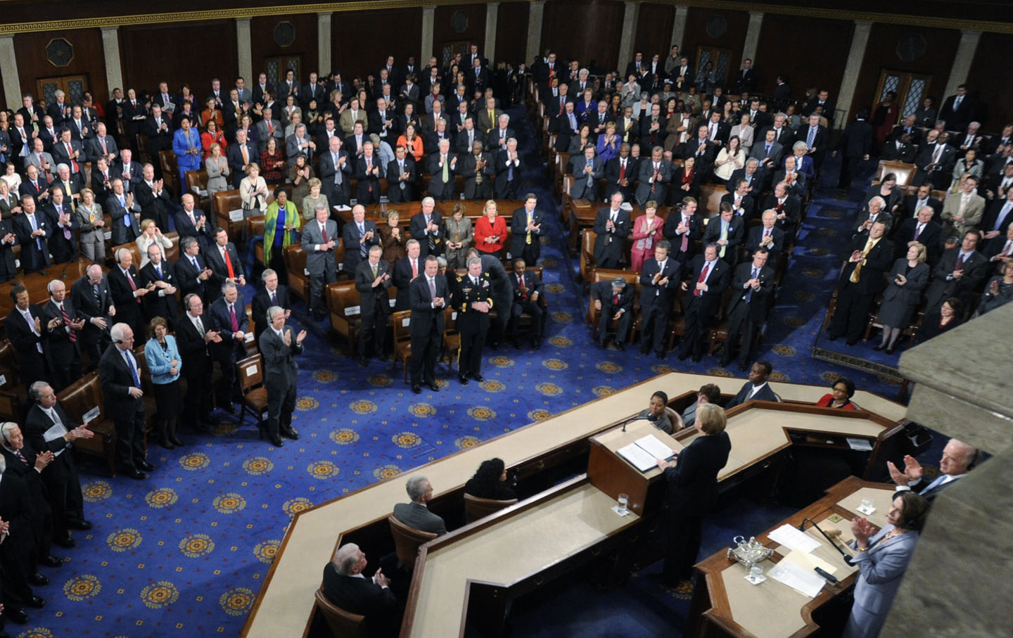 German Chancellor Angela Merkel is applauded