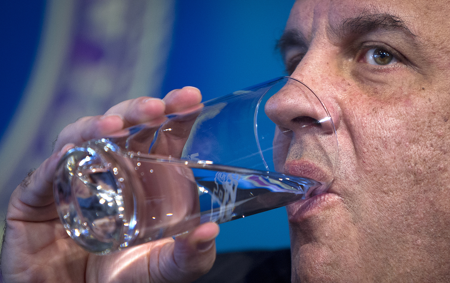 Chris Christie drinks water