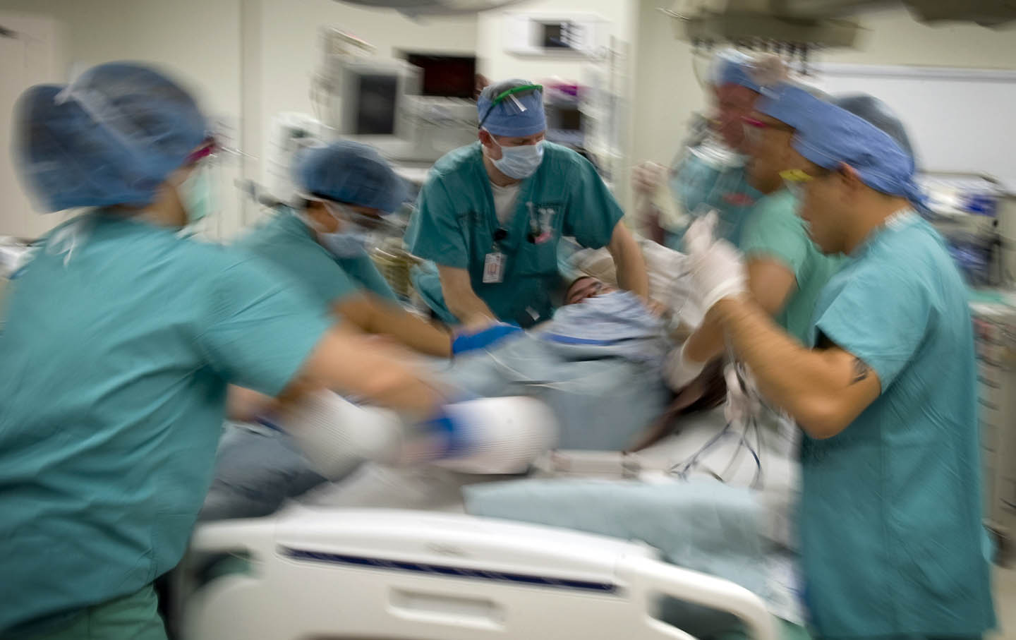 Nurses Lifting Patient