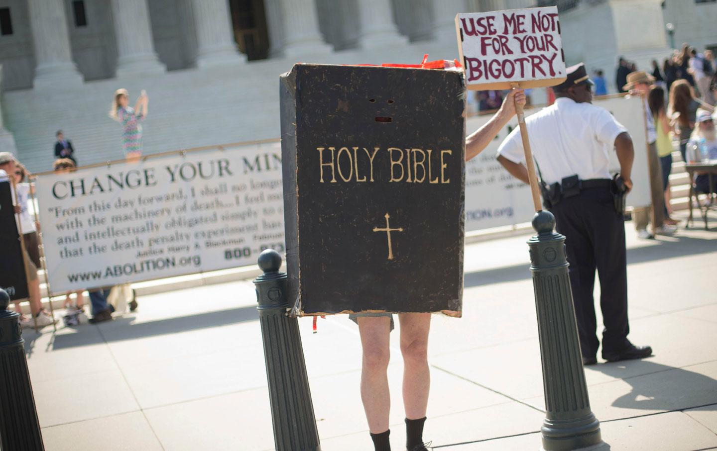 Word made flesh: A demonstrator awaits the Court’s decision in the Hobby Lobby case, June 30, 2014.