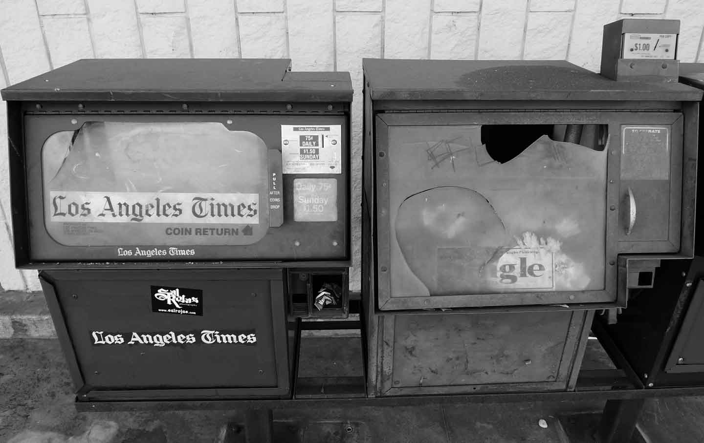 Abandoned newspaper vending machines, Covina, California, 2011.