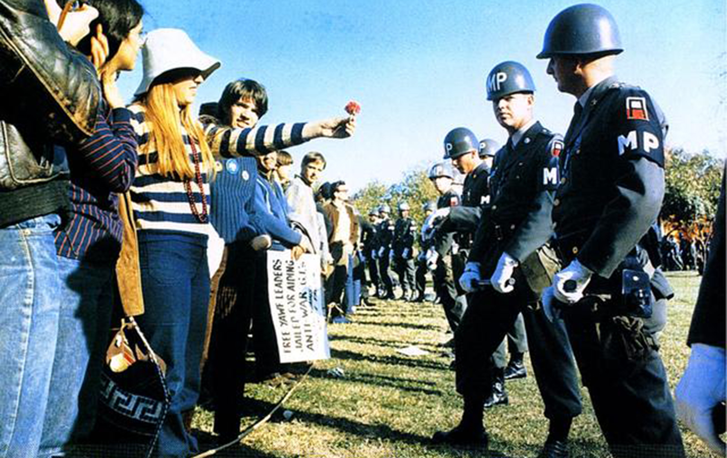 A demonstrator offers a flower to military police at a Vietnam War demonstration at the Pentagon in 1967.