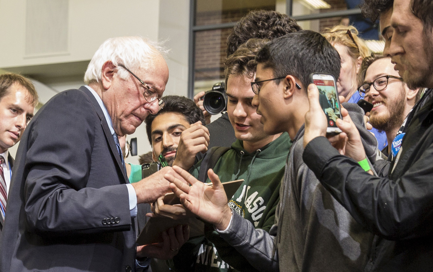 Democratic presidential candidate Sanders greets students after a town hall meeting with students at George Mason University in Fairfax