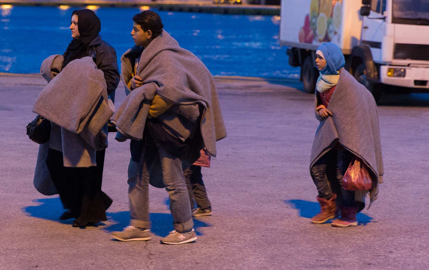 Refugees arrive by boat in Athens, December 18, 2015.