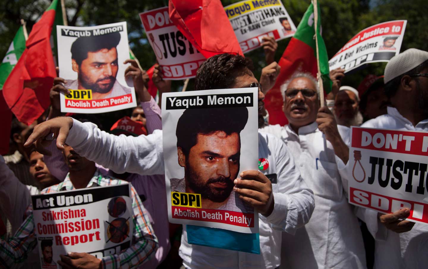 Social Democratic Party of India activists carrying placards with photographs of Yakub Memon, July 27, 2015.