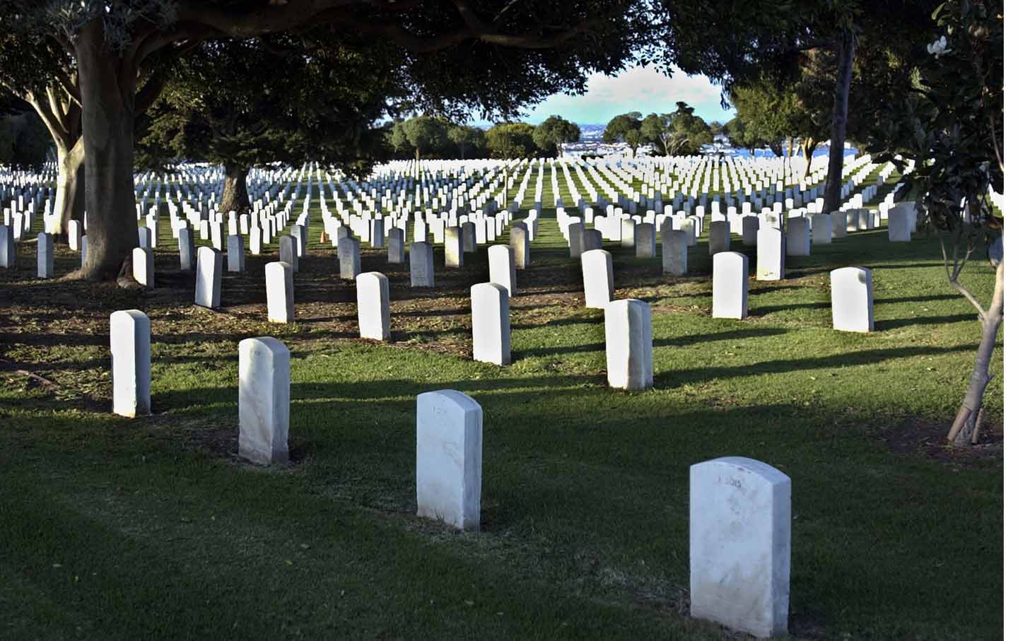 At a Military Cemetery, Trump Reflects on His Only War Hero