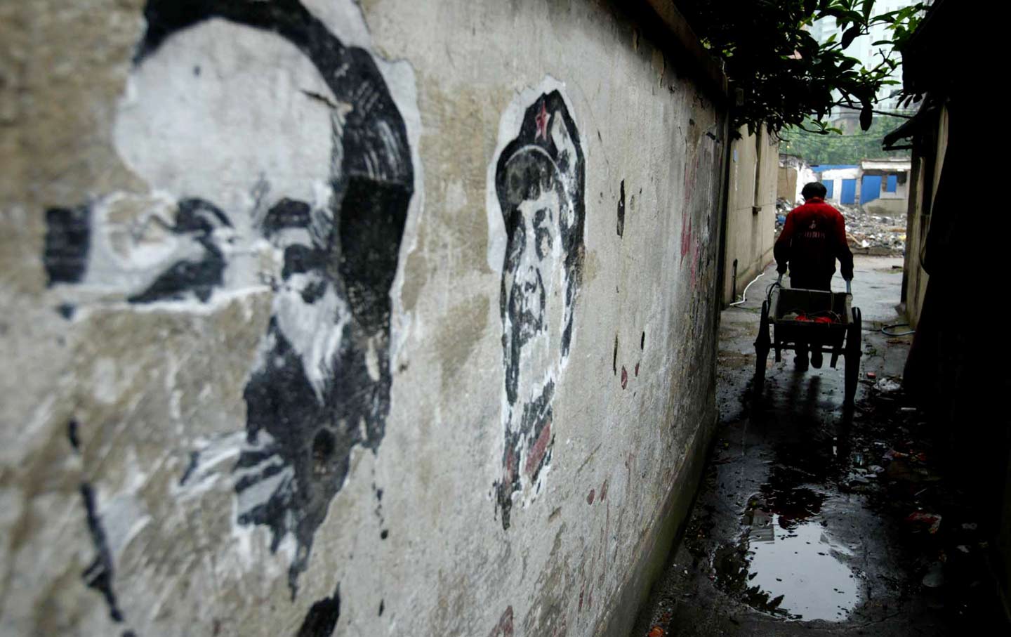 Worn portraits of Mao Zedong in Shanghai, China, 2006.
