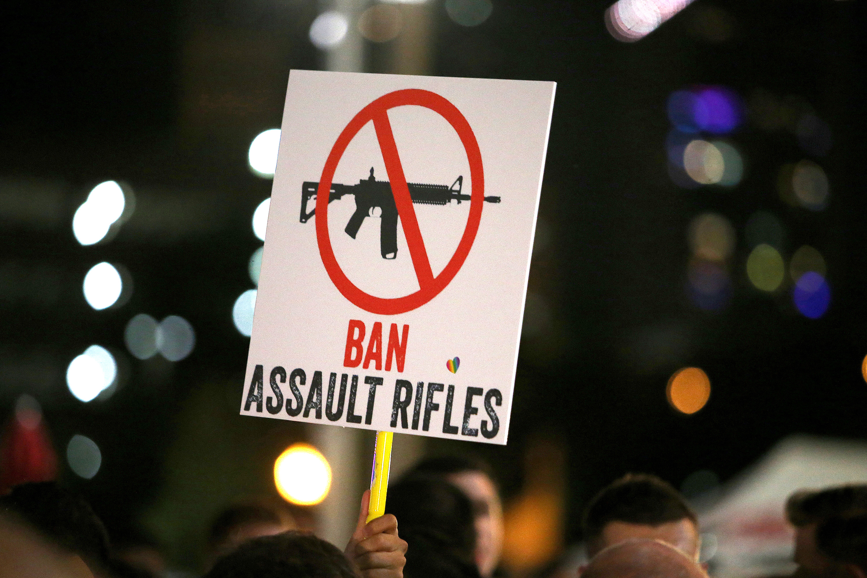 A sign at a vigil for the victims of the shooting in Orlando