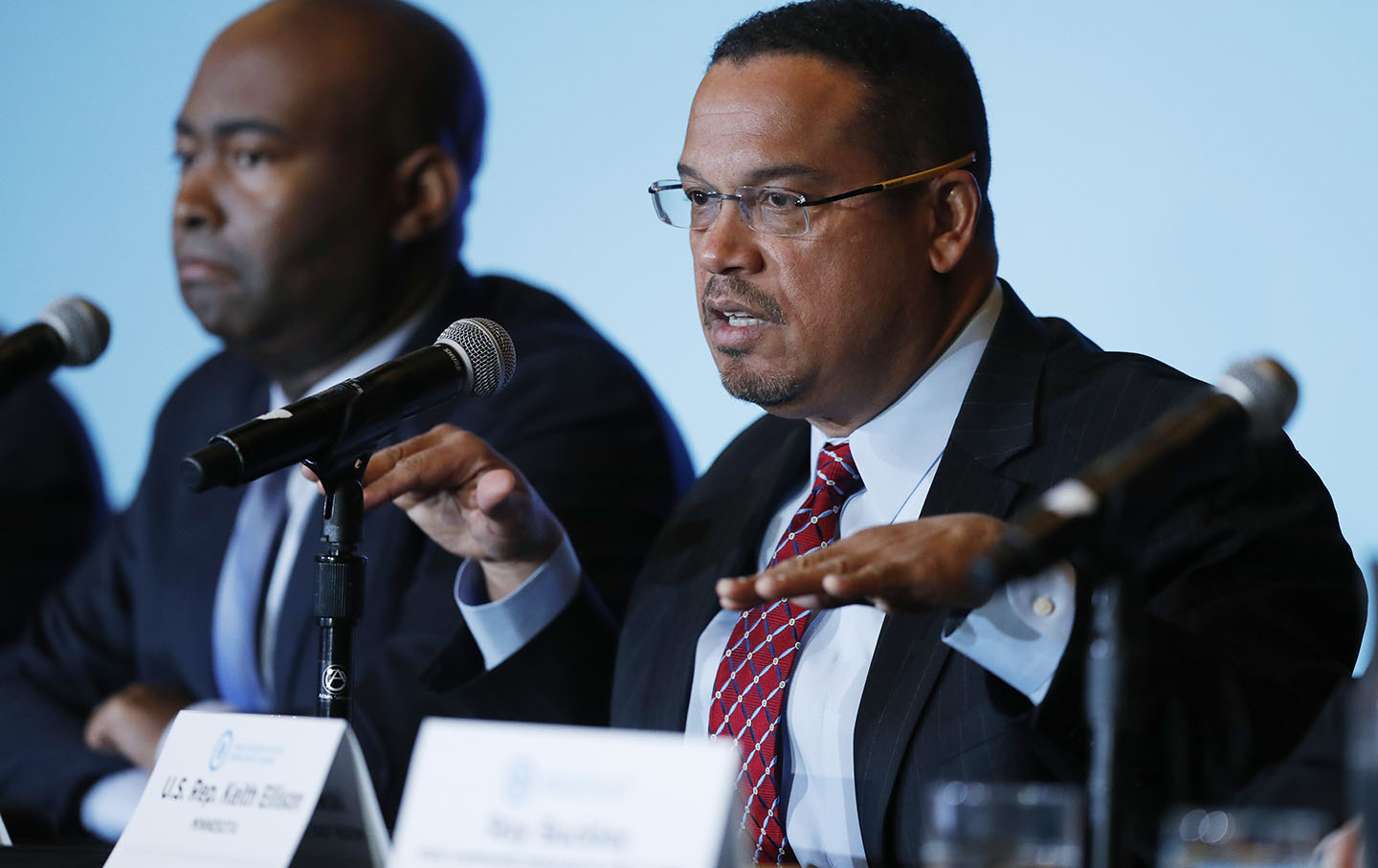 Keith Ellison and Jamie Harrison at a forum in Denver