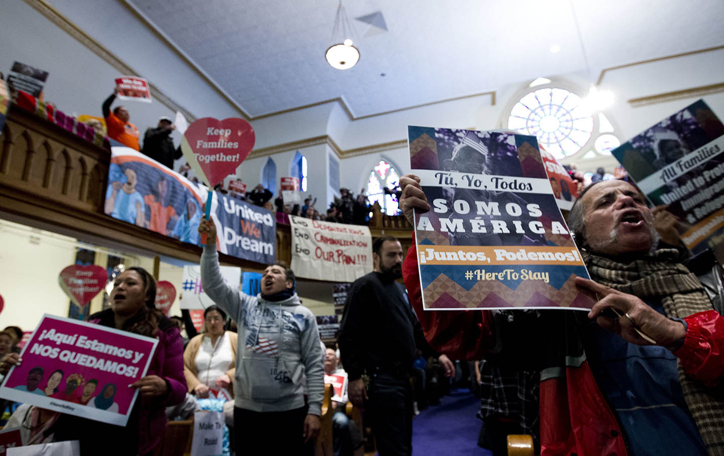 Immigrant rights advocates rally against President Donald Trump