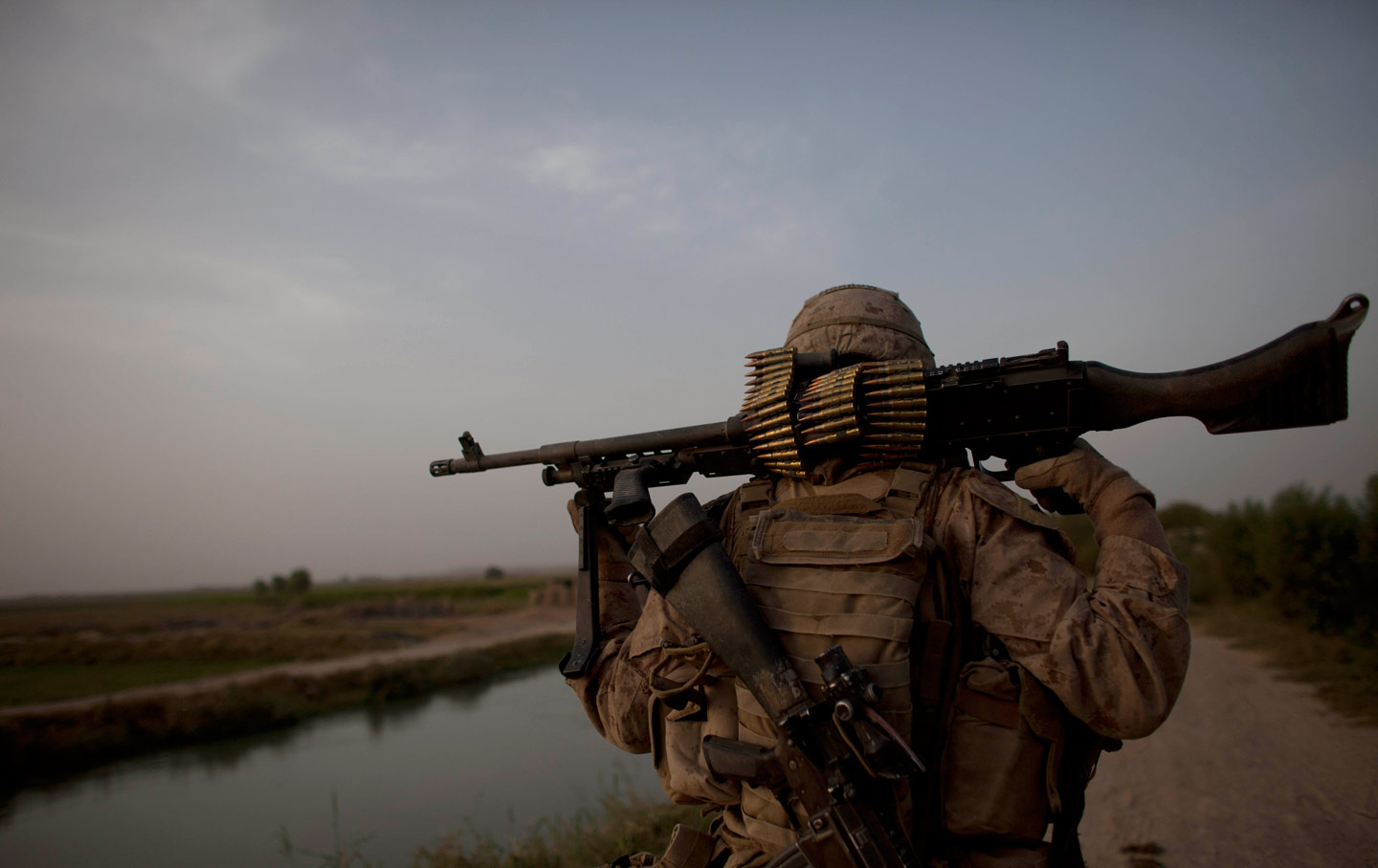 Marine walks in Afghanistan