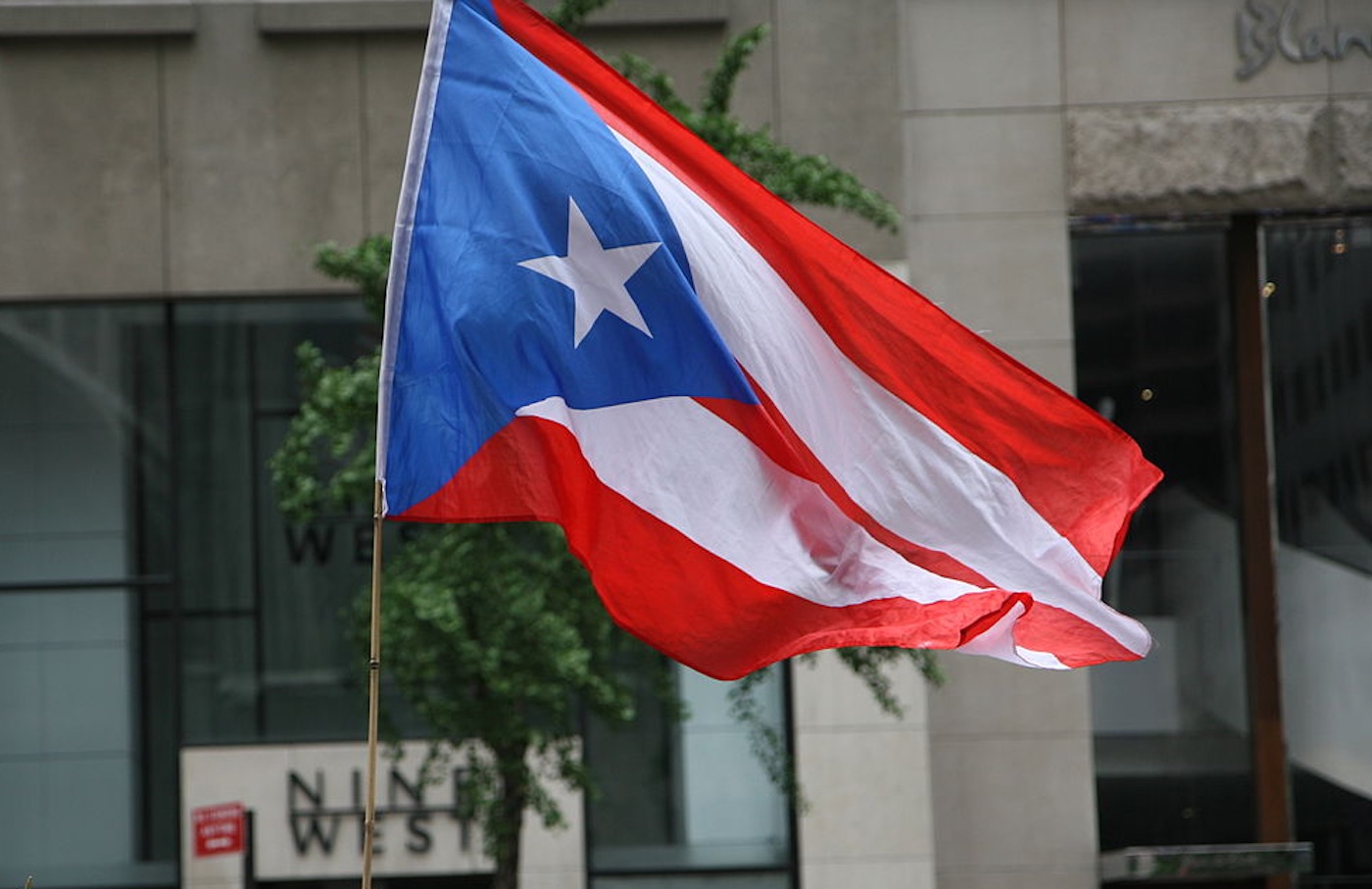 Who does not have to pay property taxes in Puerto Rico?