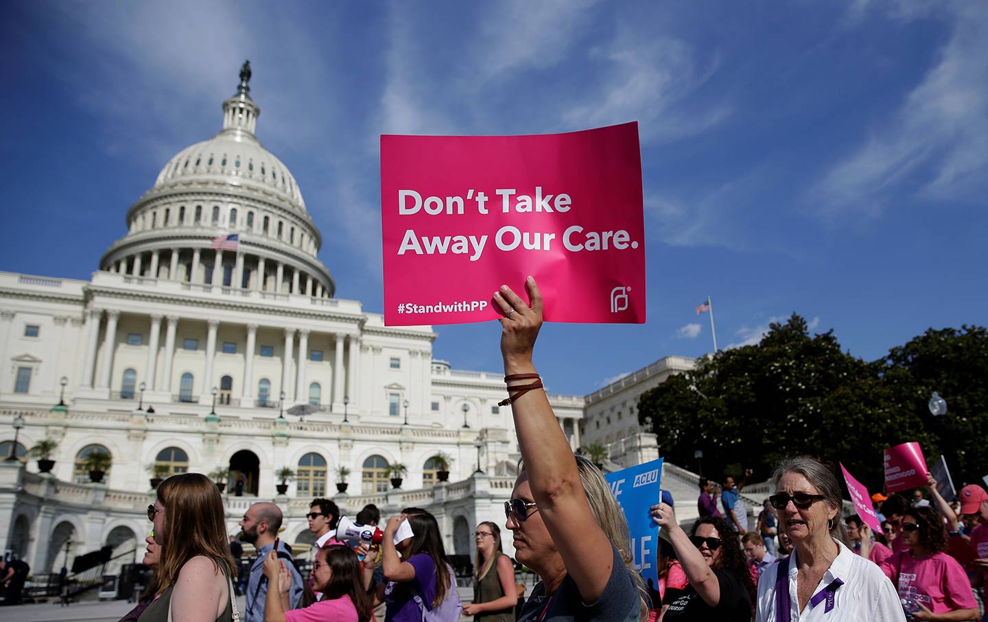 Activists protest in opposition to the Senate Republican health care bill on Capitol Hill in Washington, D.C., on June 28, 2017.