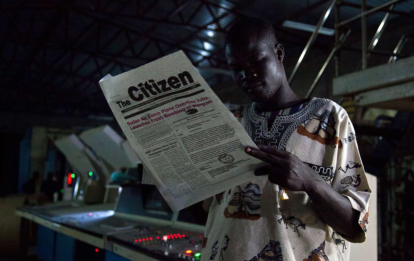 Reading a Newspaper in South Sudan
