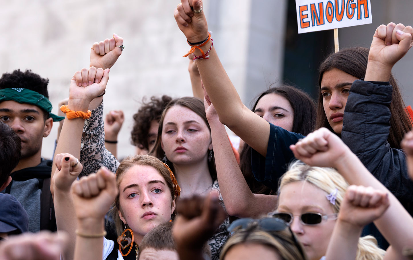 Students raise their fists