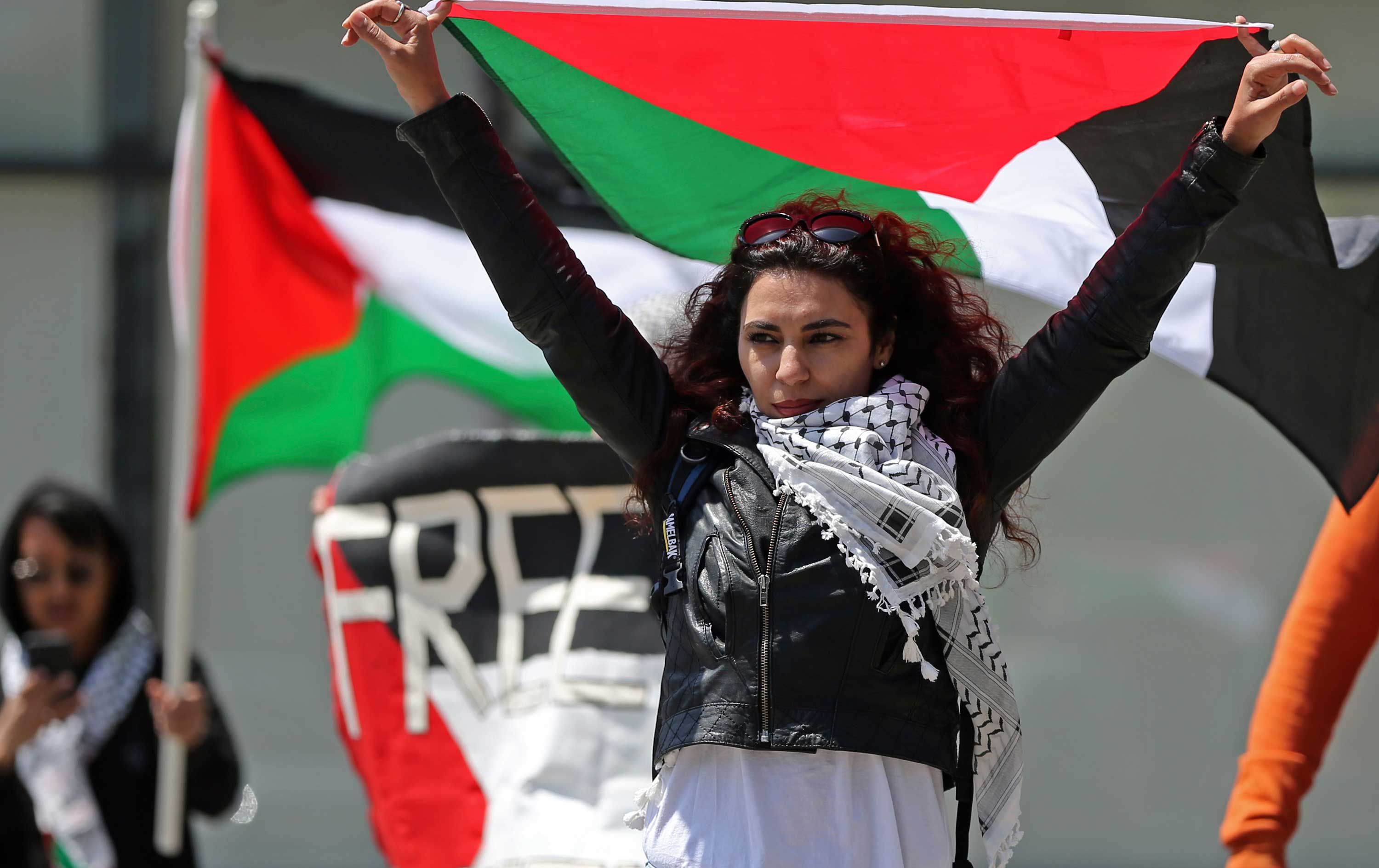 Demonstrators protest the U.S. moving its embassy from Tel Aviv to Jerusalem, outside the Israeli consulate in Los Angeles.