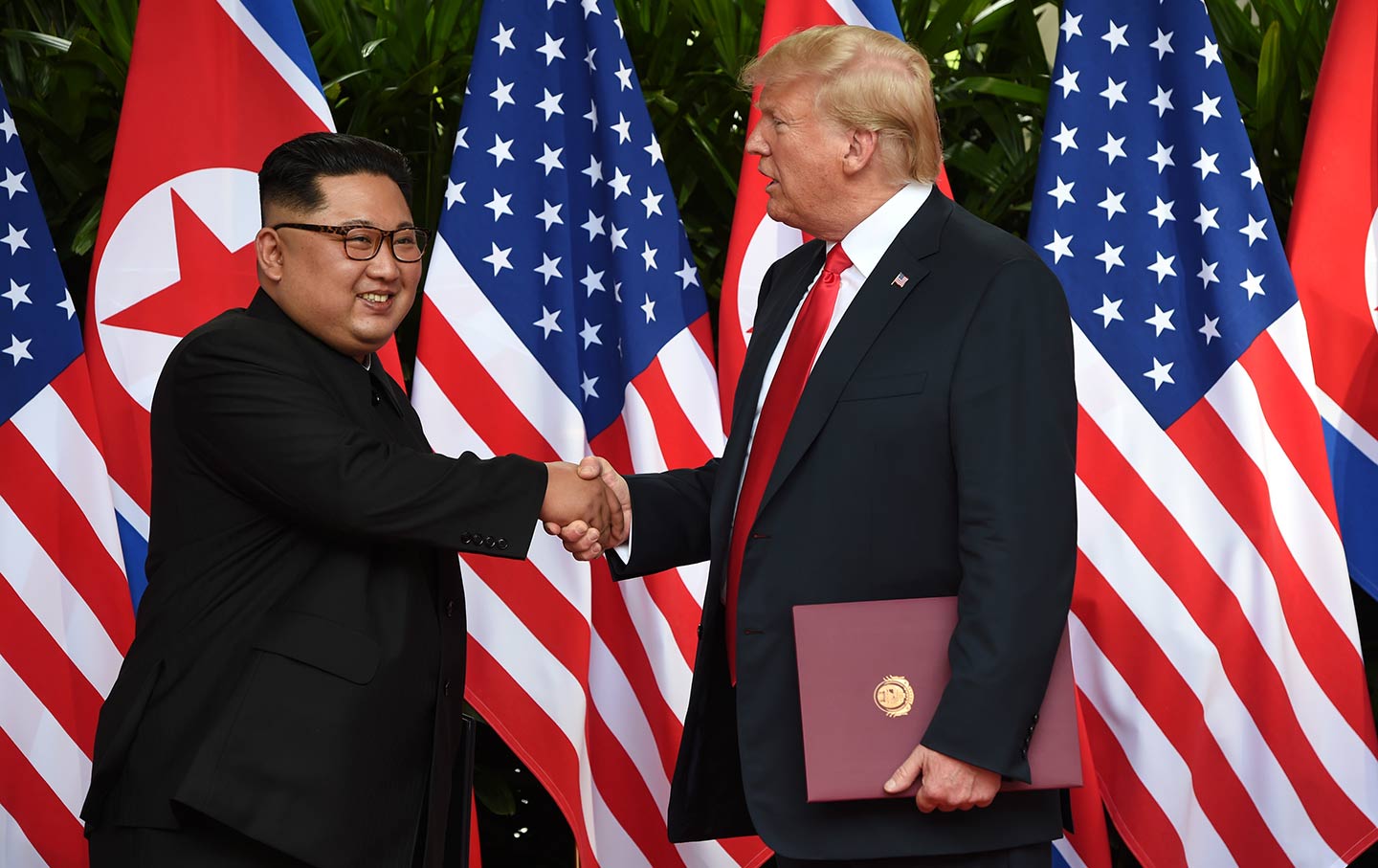 Trump Kim hand shake