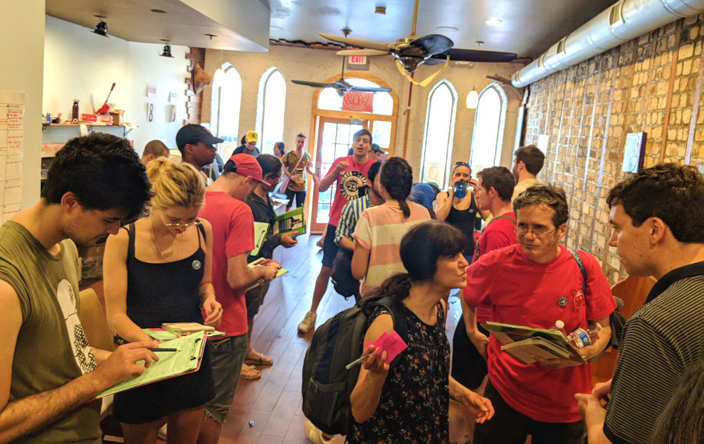 Volunteers gather at the Julia Salazar campaign headquarters