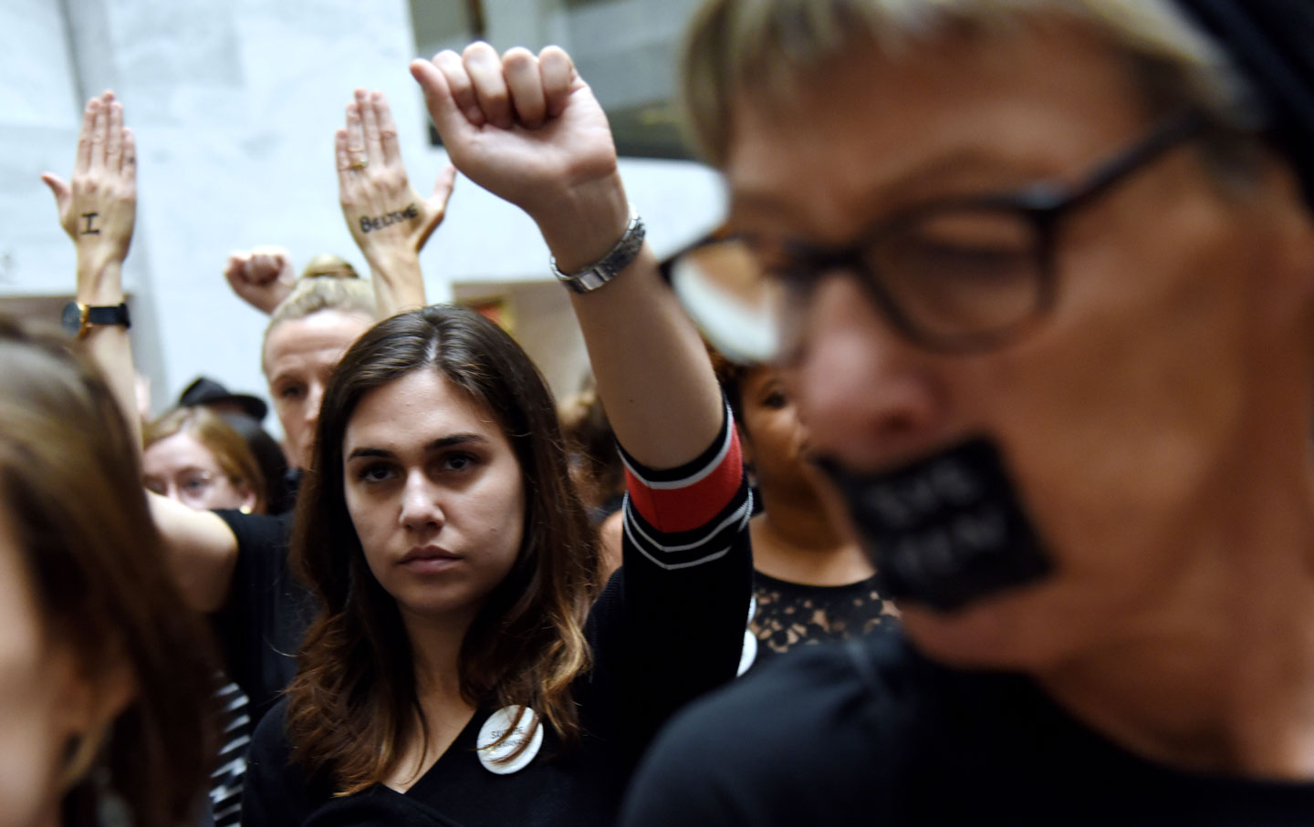 Demonstrators opposed to the Supreme Court nominee Brett Kavanaugh protest inside the Hart building on Capitol Hill.