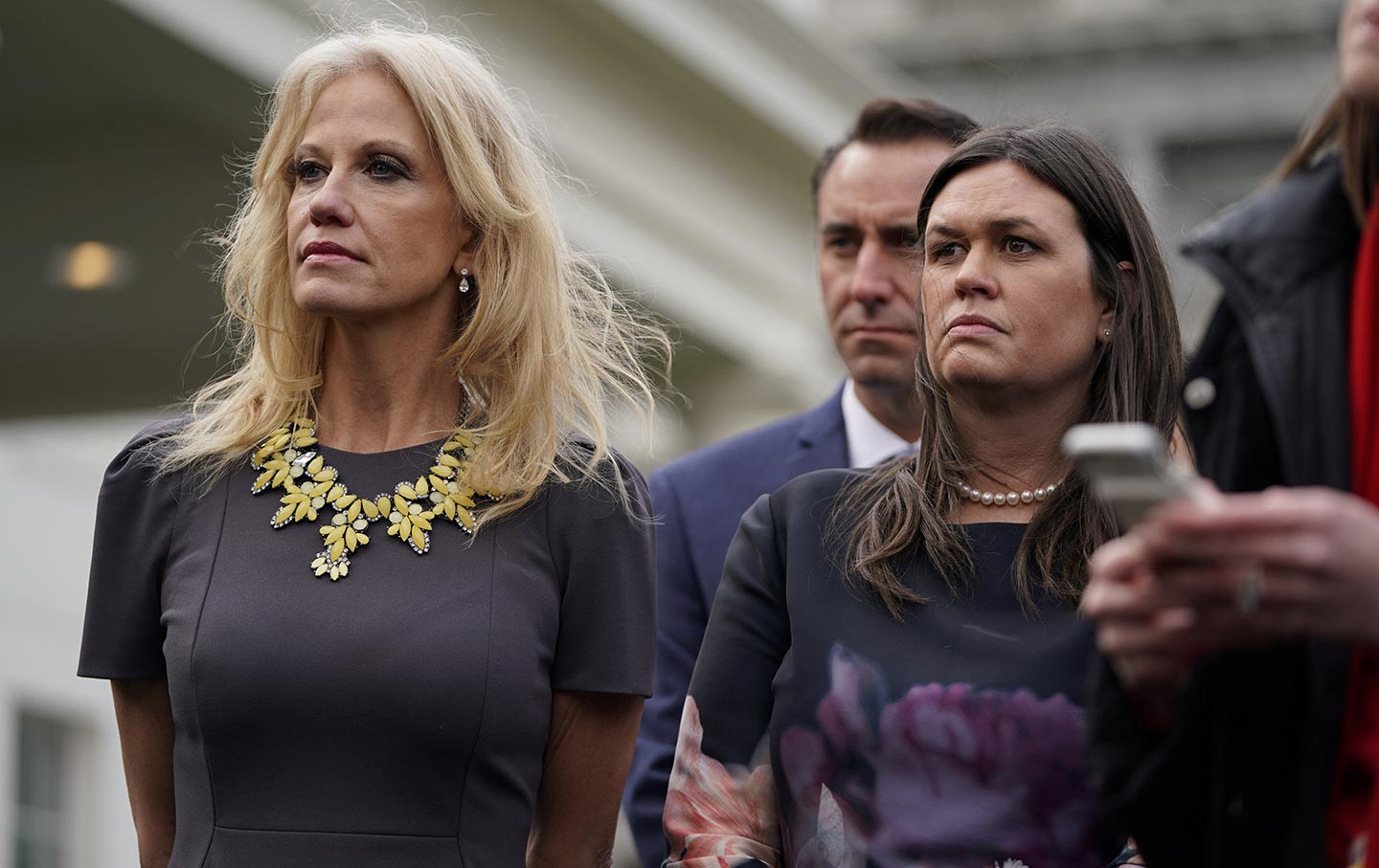 White House counselor Kellyanne Conway and Press Secretary Sarah Huckabee Sanders watch as Vice President Mike Pence speaks to reporters after a meeting between President Donald Trump and Congressional Democrats about the U.S. government partial shutdown and the president's demand for a border wall in the Situation Room at the White House in Washington, U.S., January 9, 2019. REUTERS/Joshua Roberts