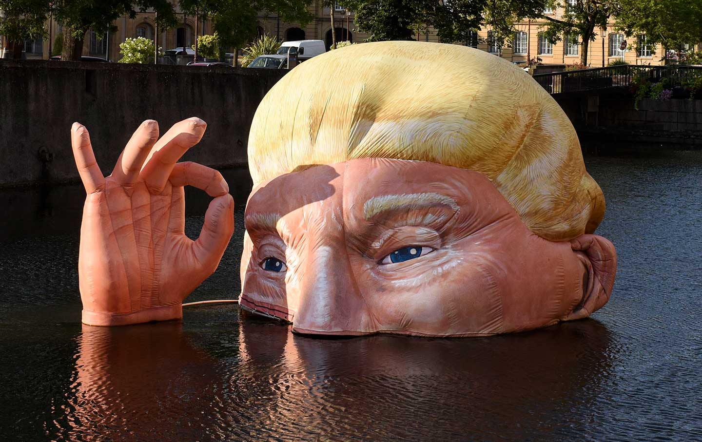 Climate art Trump drowning