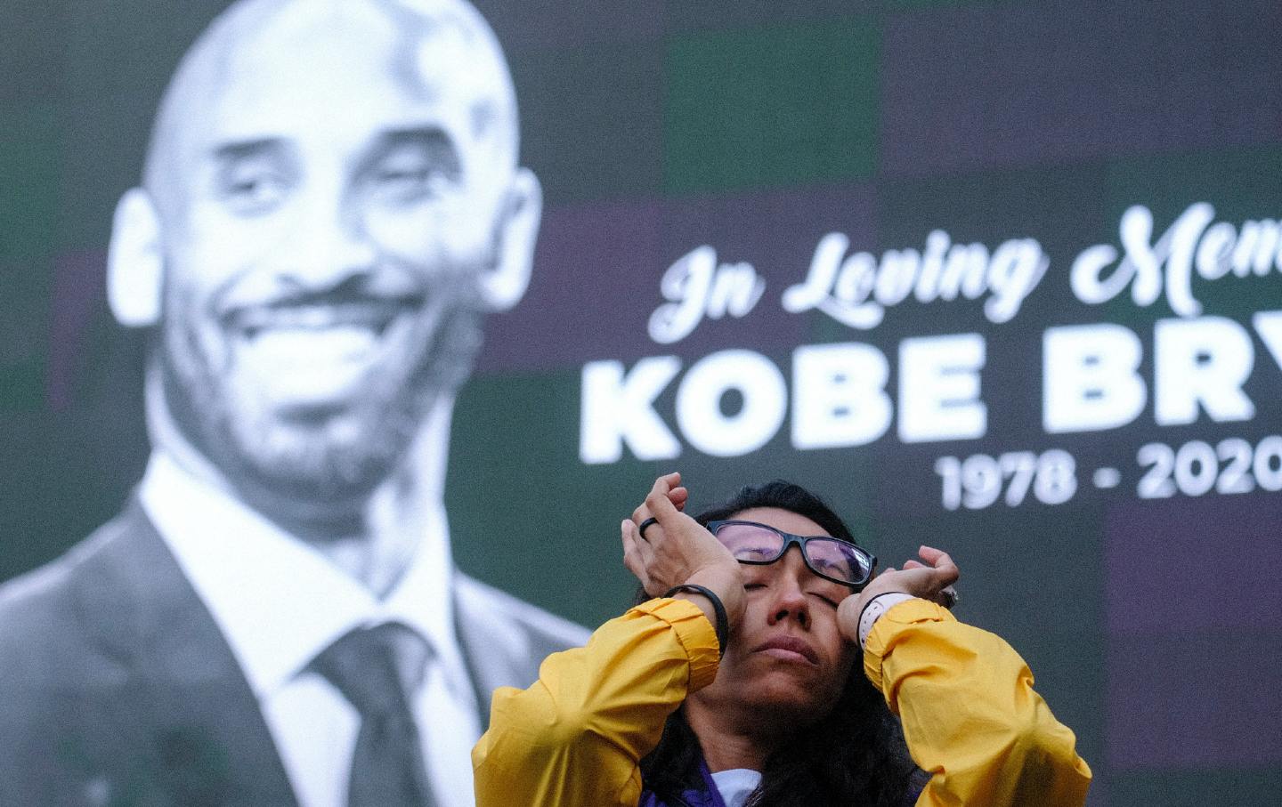 Woman at a Kobe Bryant memorial