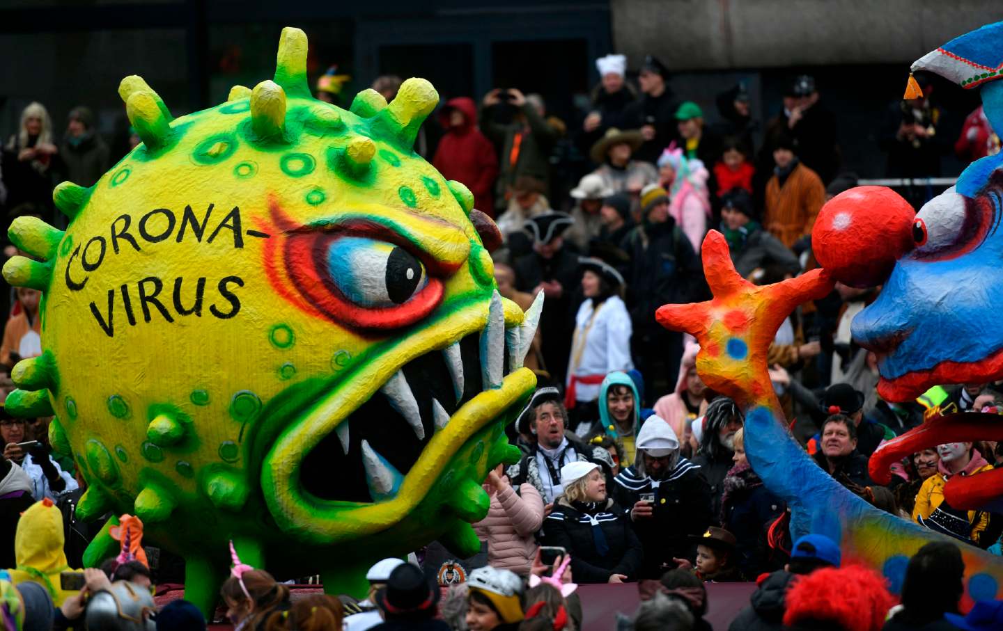 Coronavirus puppet in a carnival.