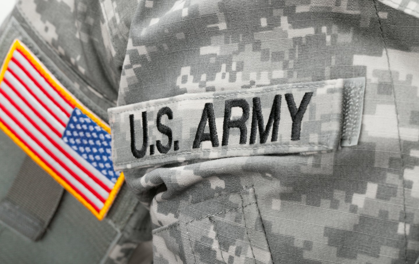 US Army and flag patch on solder's uniform