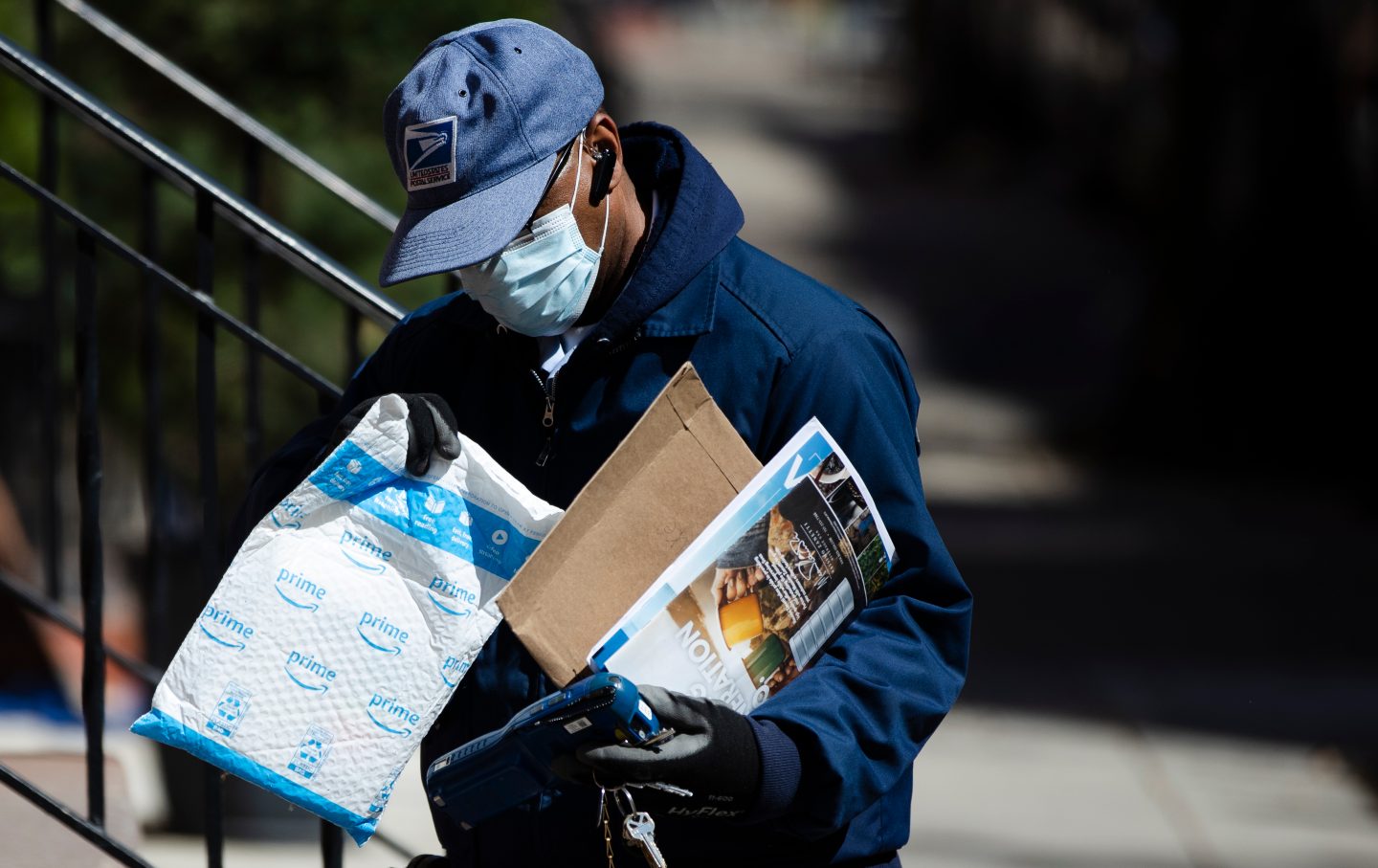 A postal worker making a delivery