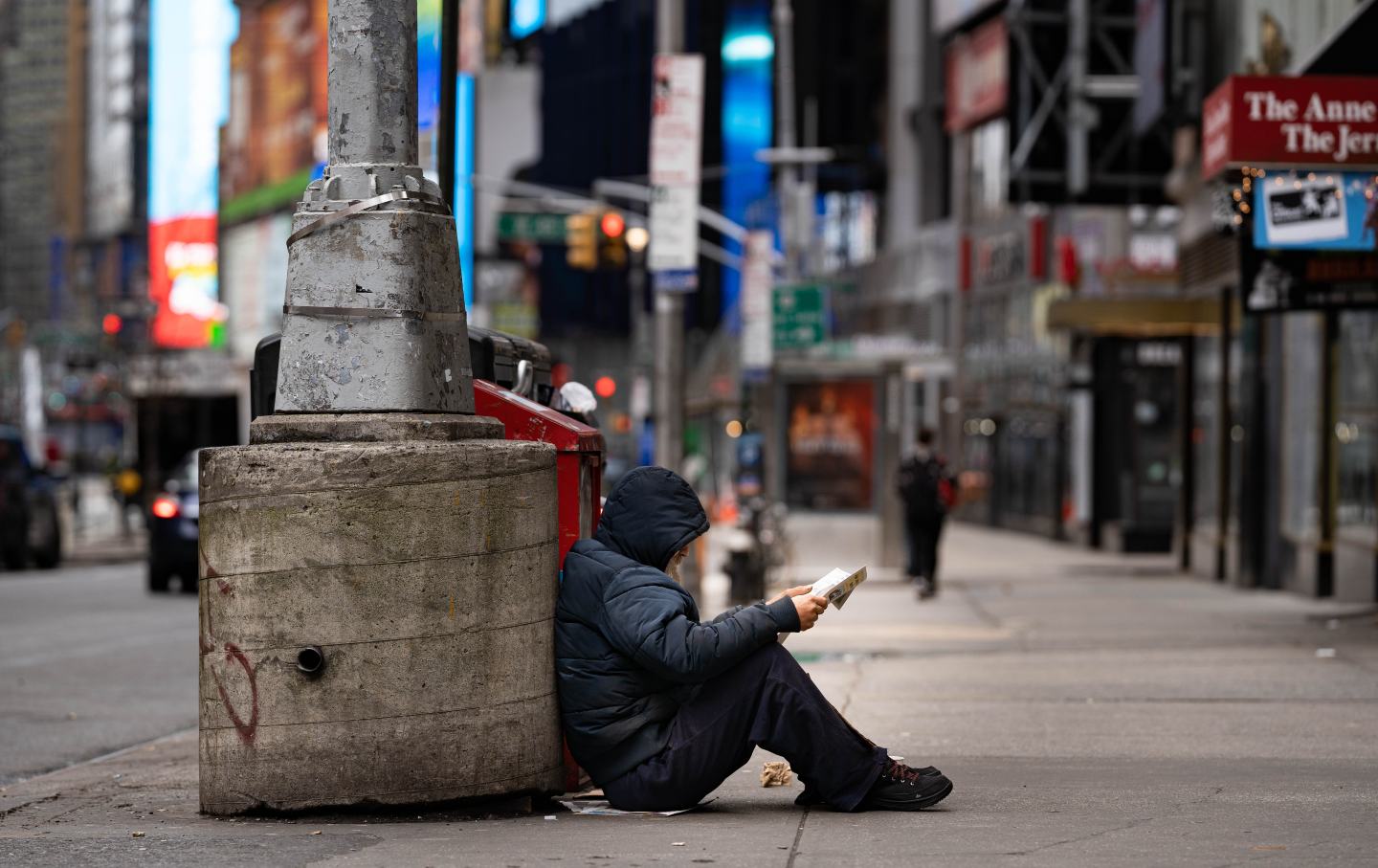 A man reads outside during the quarantine in New York City