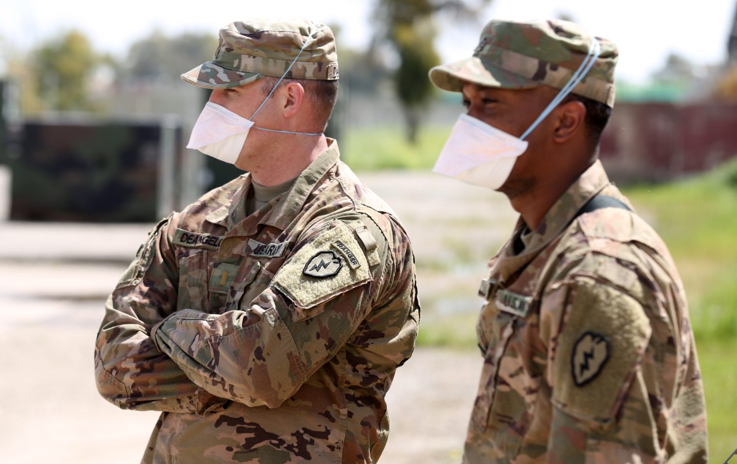 US forces wearing protective gear on an air base