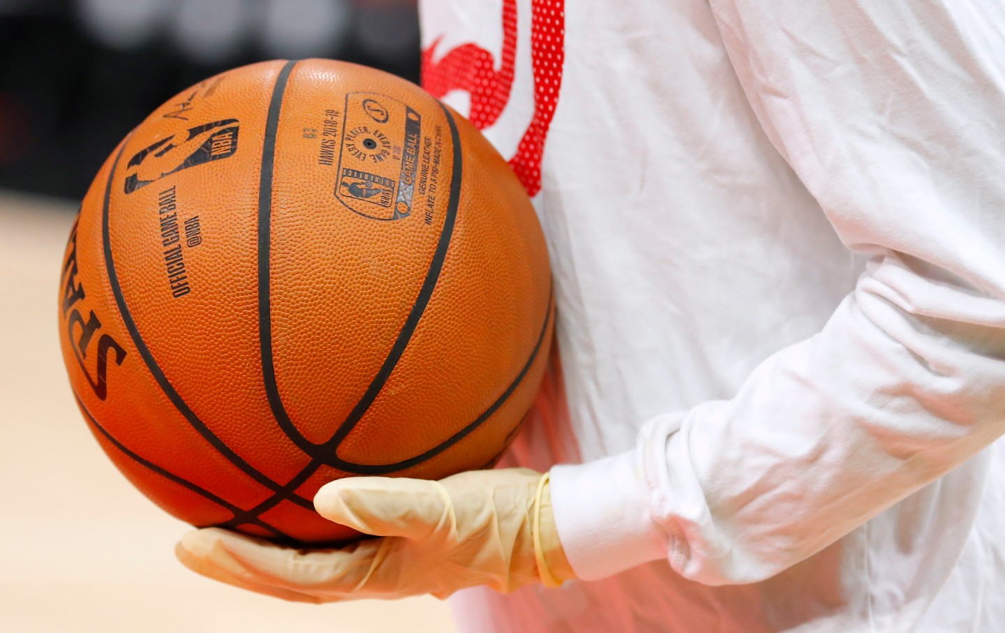 NBA ballboys wear gloves