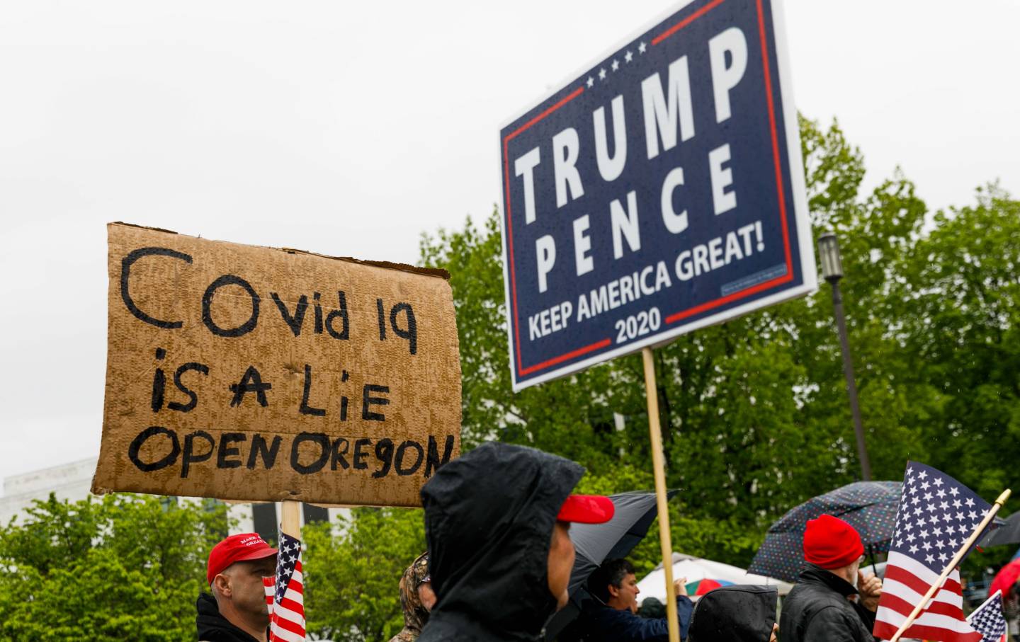 protester holds sign that says 