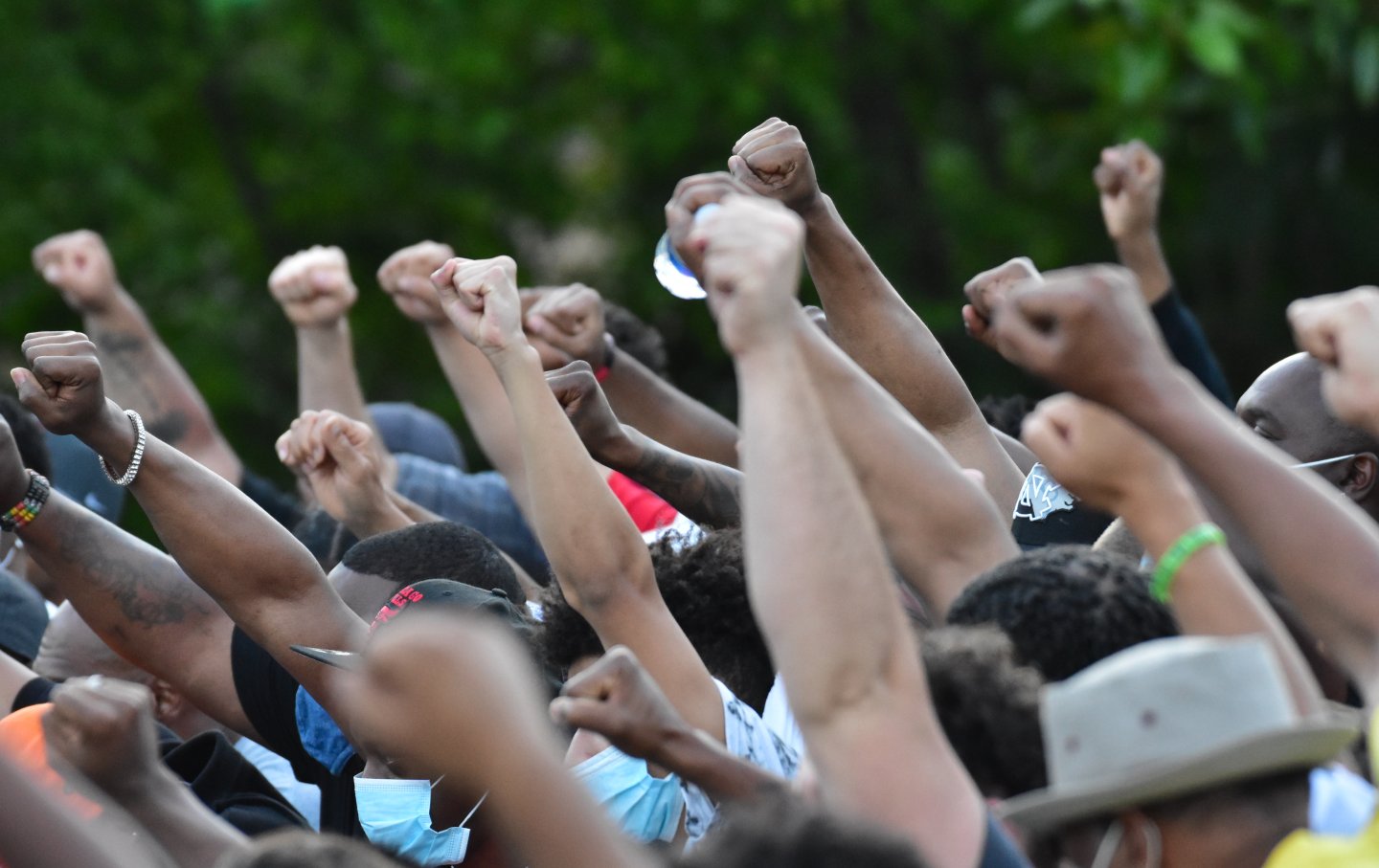 People Raise Fists at George Floyd Rally