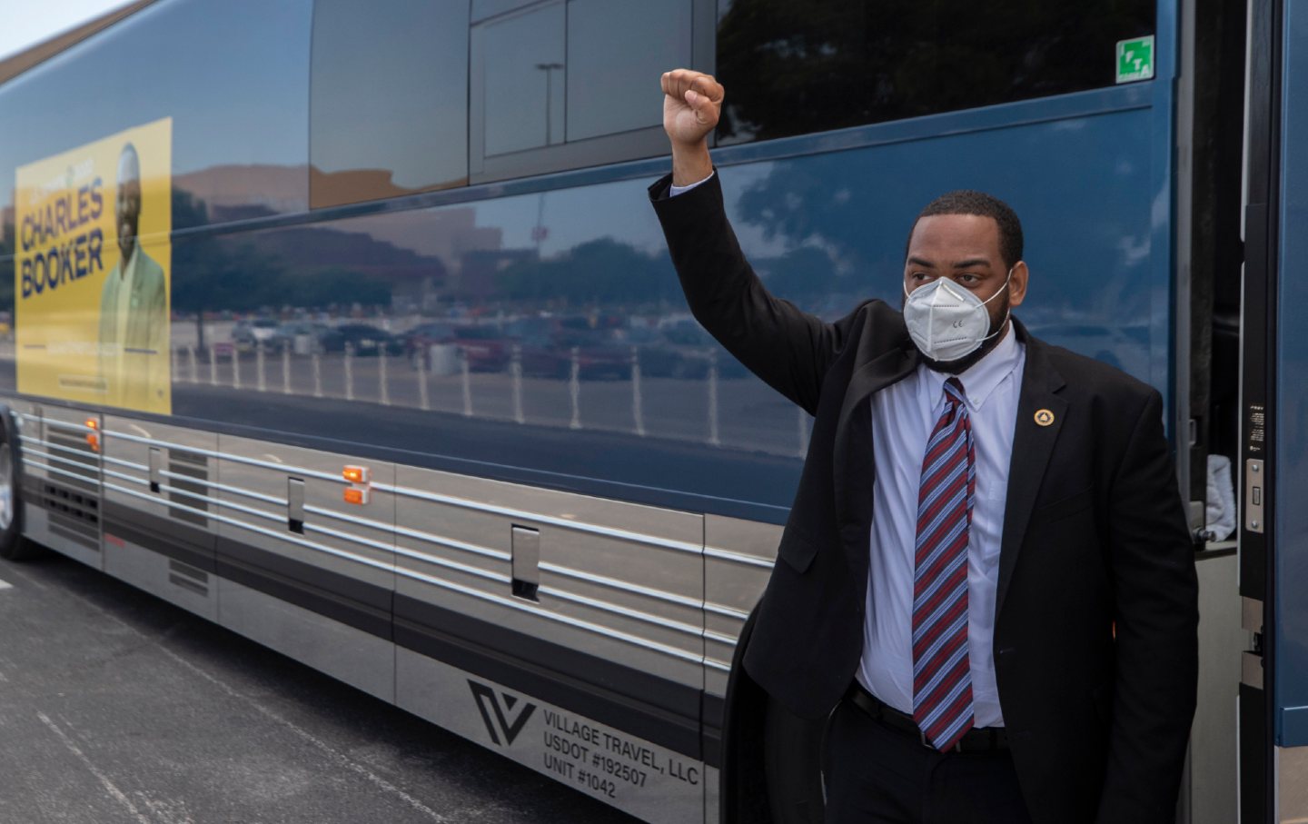 Charles Booker raises his fist