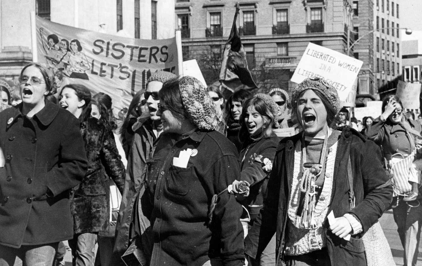 Women marching with signs