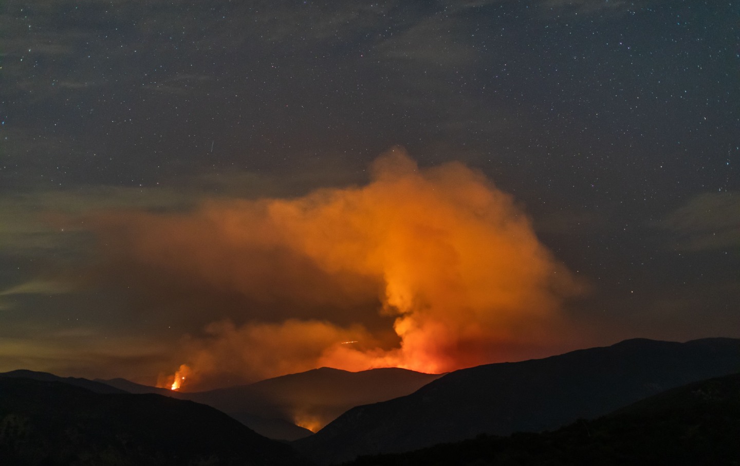 Wildfire rising in forest north of Los Angeles.