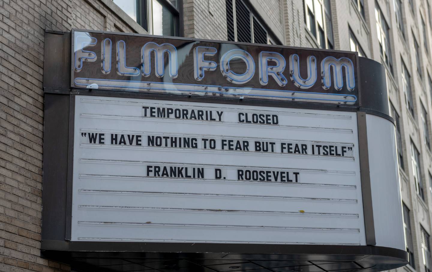 A worn down marquee reads 