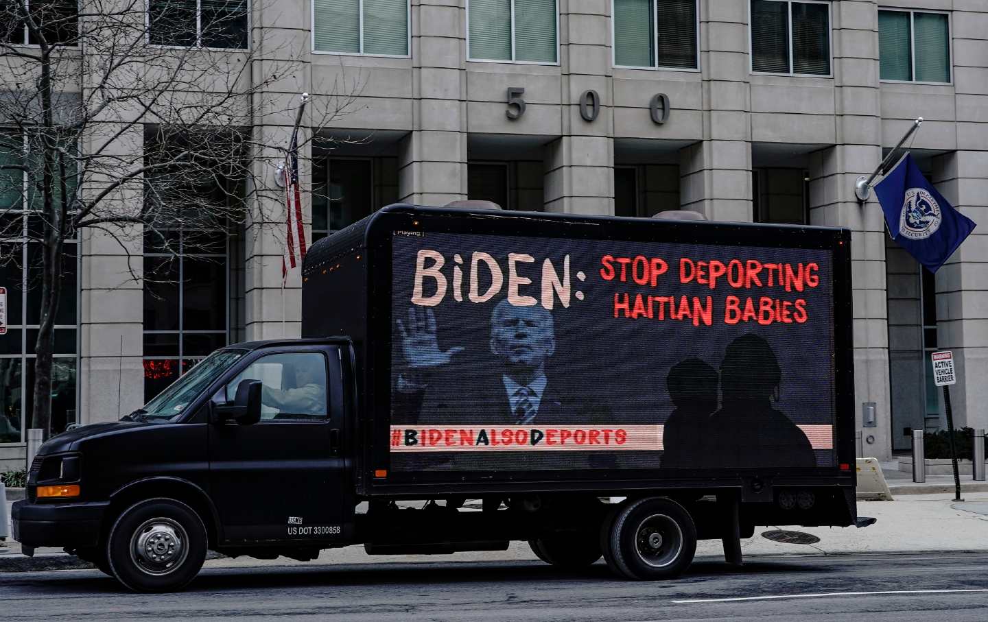 Truck w/ LED STOP DEPORTATION messages