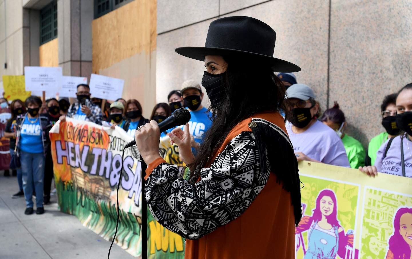 Domestic workers hold rally for health and safety protections.