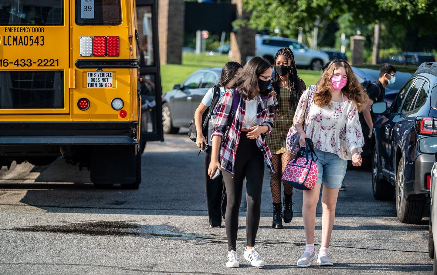 High school students arriving at school