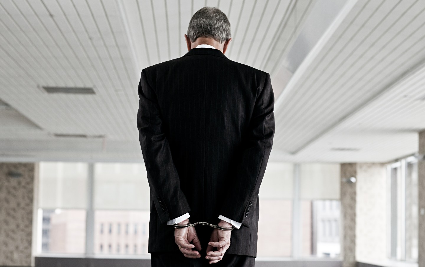 Businessman in Handcuffs