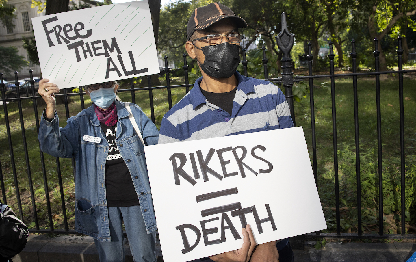 [Two protesters holding 